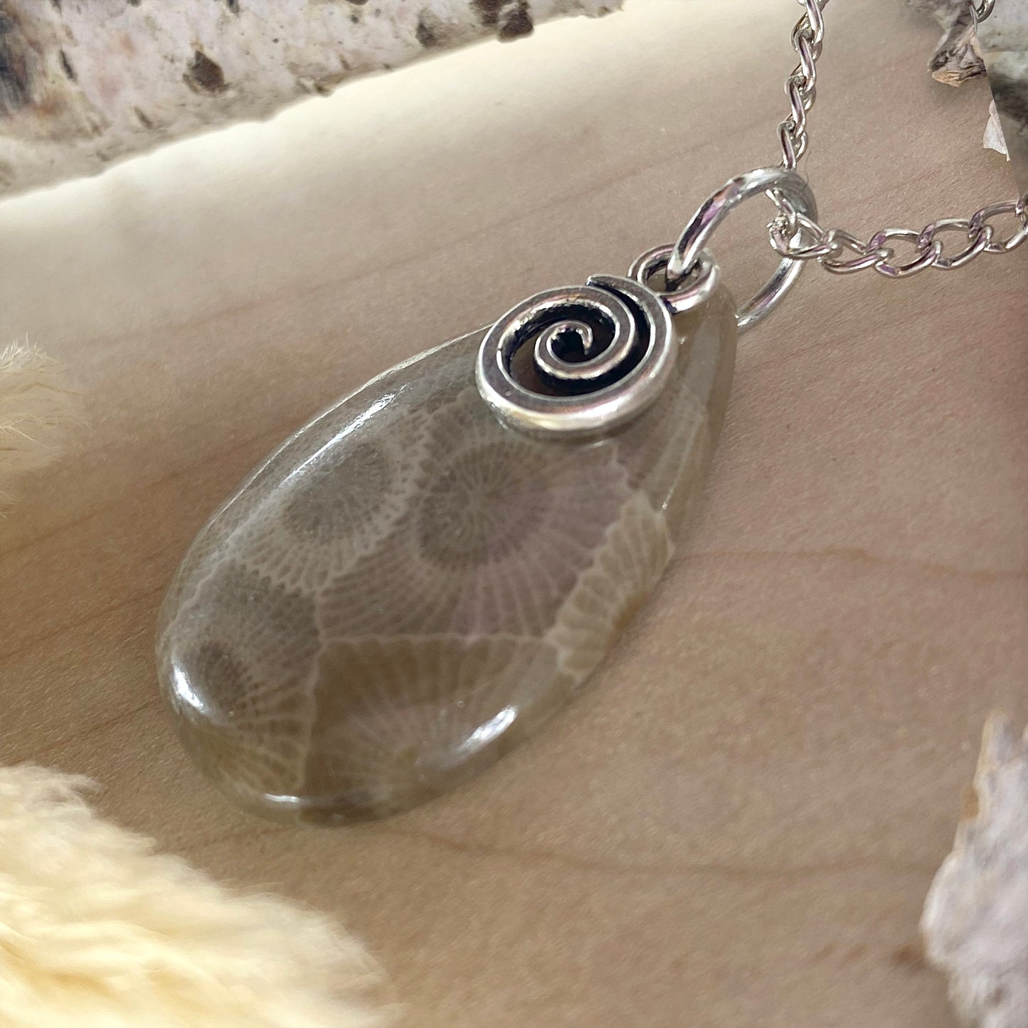 NOTE: The pendant you receive will be similar to the one pictured. Since each Petoskey Stone is unique, each pattern will also be unique.