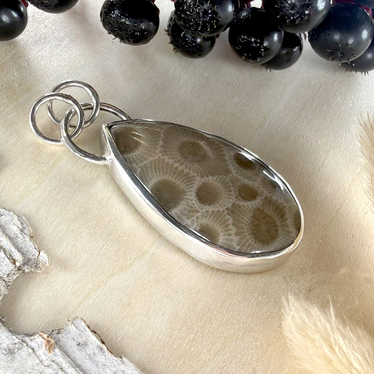 Handcrafted Sterling Silver Petoskey Stone Pendant – Michigan State Stone