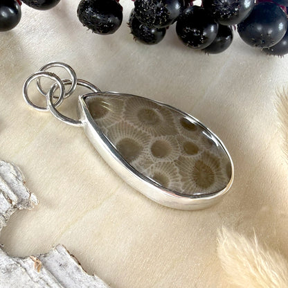 Handcrafted Sterling Silver Petoskey Stone Pendant – Michigan State Stone