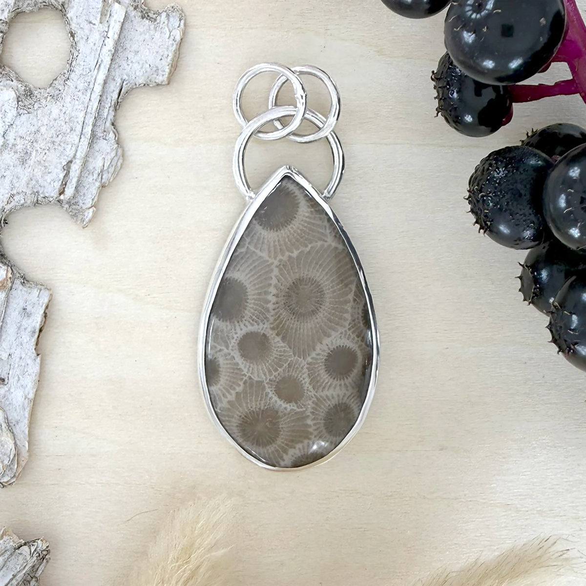 Handcrafted Sterling Silver Petoskey Stone Pendant – Michigan State Stone