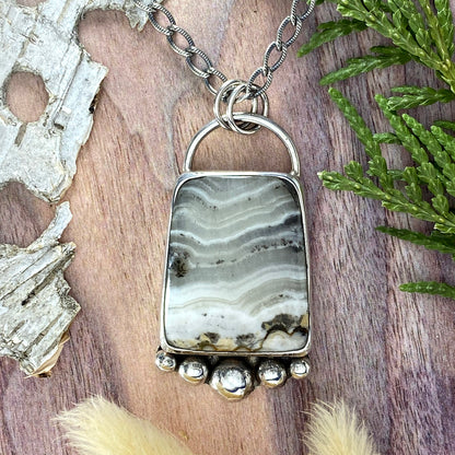 Sagenite Silver Lace Onyx Pendant Front View II - Stone Treasures by the Lake
