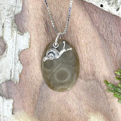 Petoskey Stone Pendant Necklace with Snail Charm Front View - Stone Treasures by the Lake