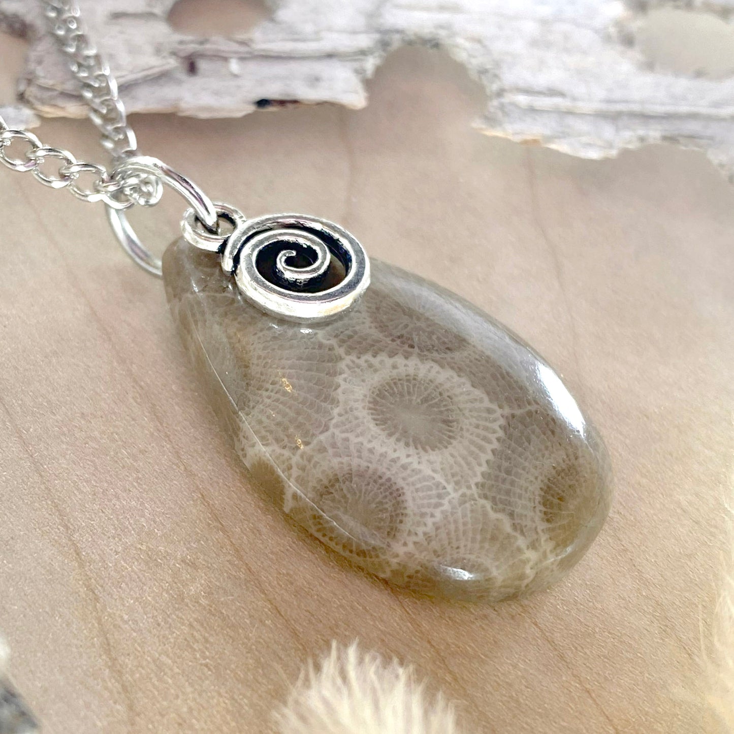 NOTE:  The pendant you receive will be similar to the one pictured.  Since each Petoskey Stone is unique, each pattern will also be unique.  